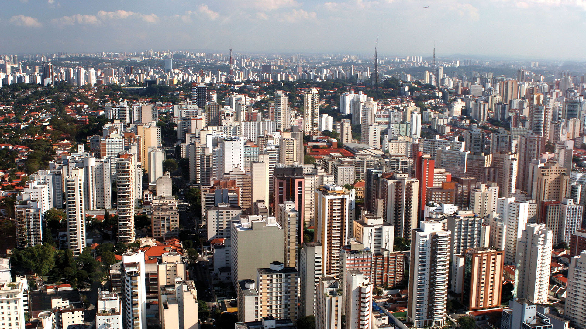 Highrise buildings march toward the horizon as part of the vast cityscape of São Paulo. (Photo by Ana Paula Hirama.)