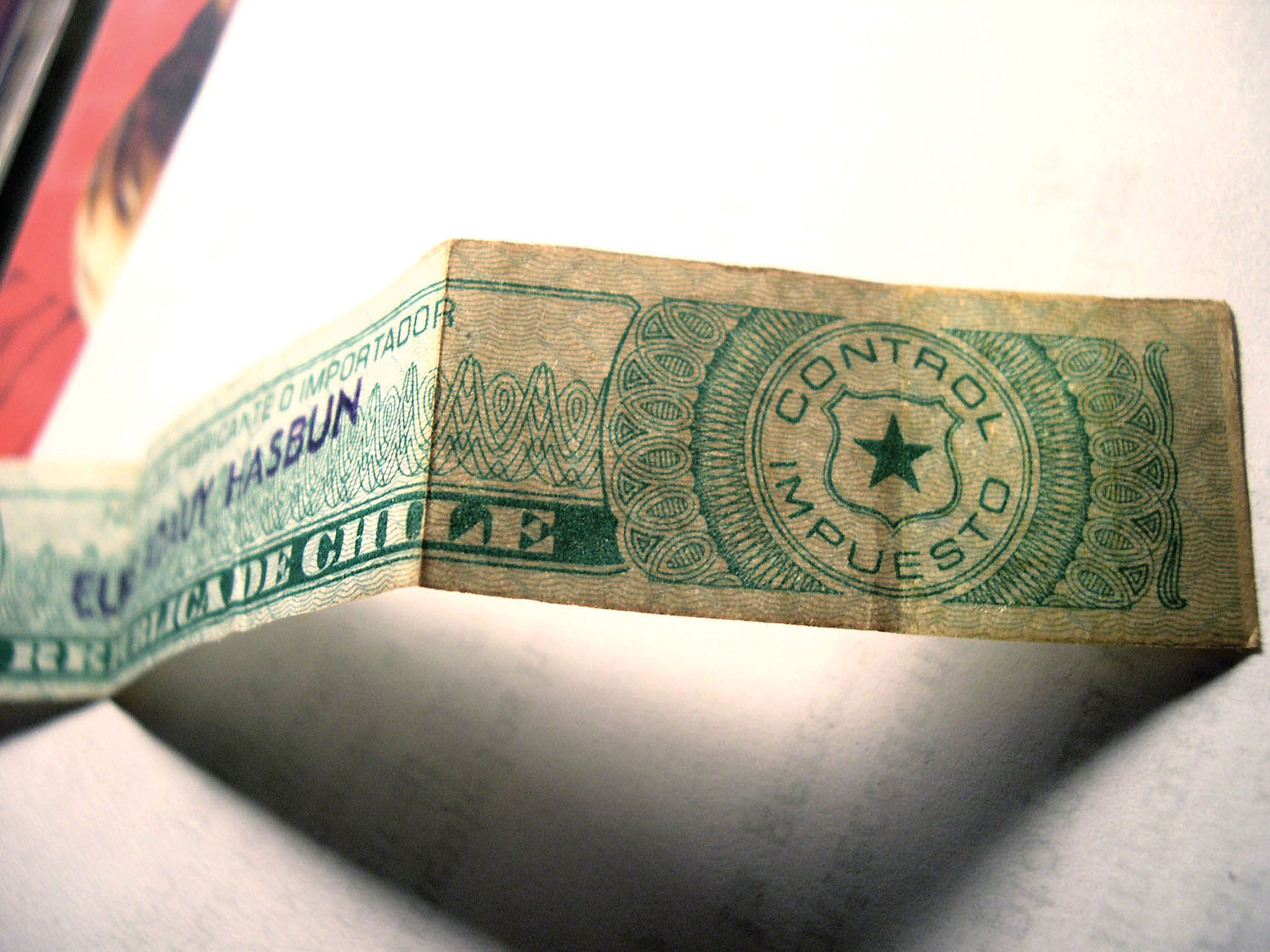 A Chilean tax stamp. (Photo by Matías Aros Márza.) The ribbon of a Chilean tax stamp. (Photo by Matías Aros Márza.)