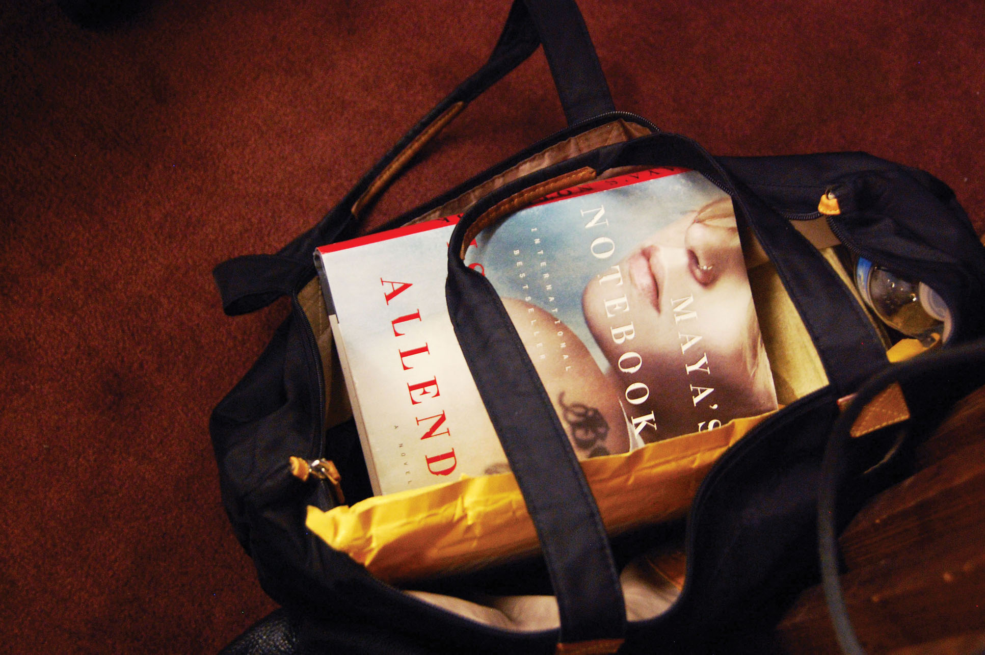 Isabel Allende's novel Maya's Notebook sits atop a carrying back at the talk. (Photo by Megan Kang.)