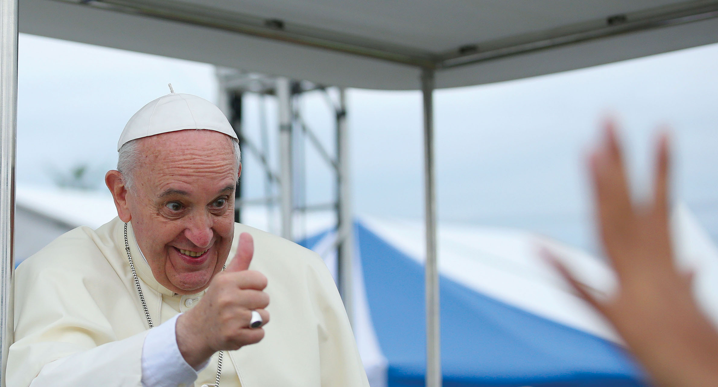 A smiling Pope Francis gives a thumbs up during an event in Seoul, South Korea. (Photo by Jeon Han/Korea.net.)