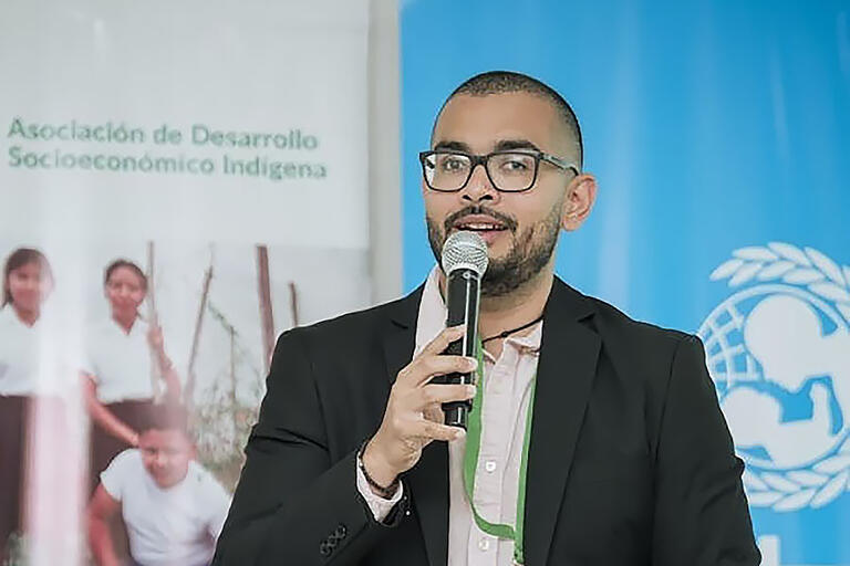 Portait of Rafael Meza Duriez at a UNICEF conference.