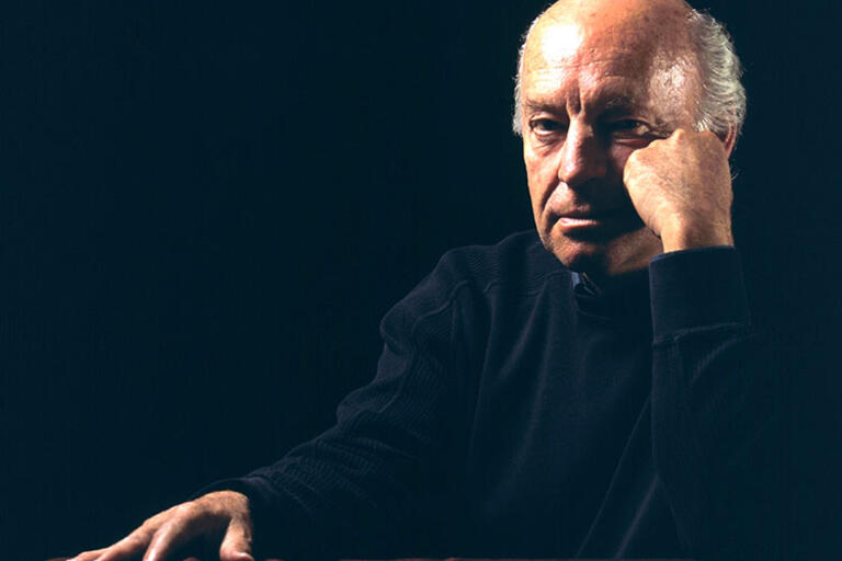 Eduardo Galeano wearing a black turtleneck sweater