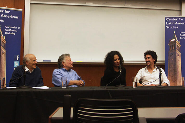 CLAS Chair Harley Shaiken moderates a discussion with Lowell Bergman, Daffodil Altan, and Andrés Cediel. All seated in front of the audience