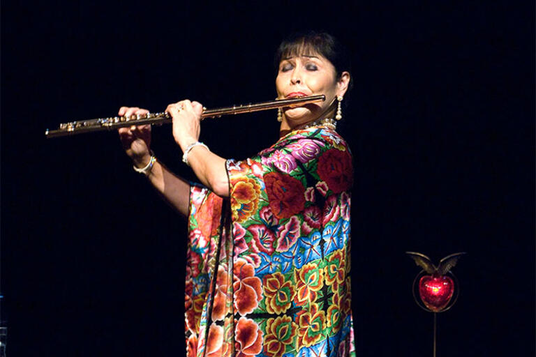 Elena Duran playing the flute