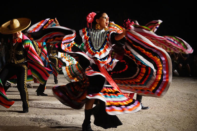 Mexican dancer wearing a colorful dress