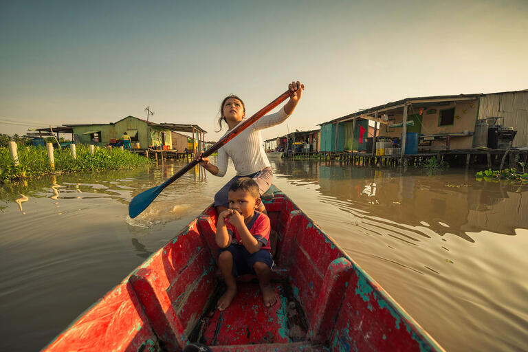 Children in a boat, from Once Upon a Time in Venezuela. (Photo by John Márquez.)