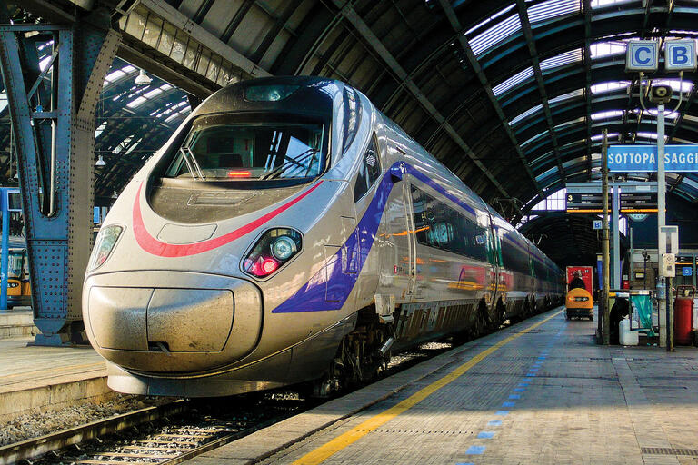A sleek Italian high-speed train built in Europe waits to depart the station. (Photo by Ciccio Pizzetarro.) 