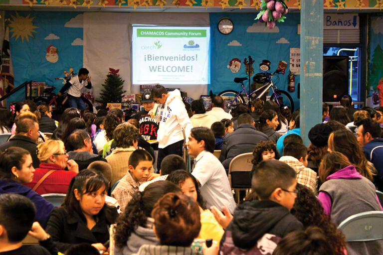 Families gather at a Chamacos Communication Forum. (Photo courtesy of the Center for Environmental Research and Children’s Health.)