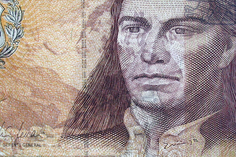 A closeup photo of the image of Tupac Amaru on Peruvian currency. (Photo by Abner Ballardo.)