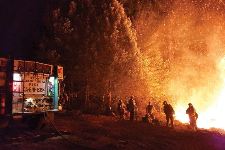 A photo of firefighters battling the Camp Fire in northern California, 2018. (Photo courtesy of Pacific Southwest Region 5, U.S. Forest Service.)