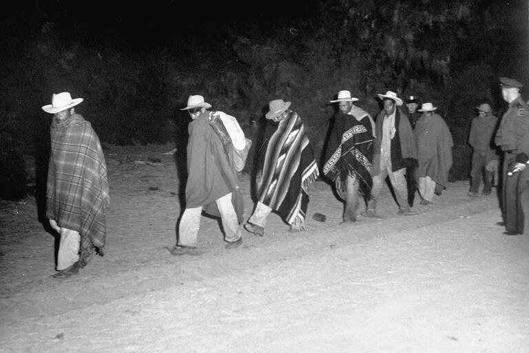 A line of undocumented migrants being deported, 1951. (Photo by Loomis Dean/Time Life Pictures/Getty Images.)