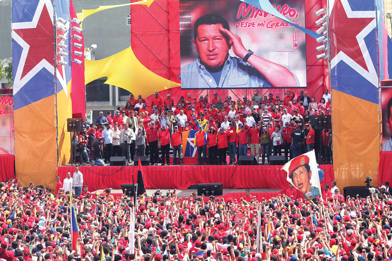 On a stage before a huge crowd, symbols of chavismo dominate Maduro's announcement of his candidacy for president. (Photo by chavezcandanga.)