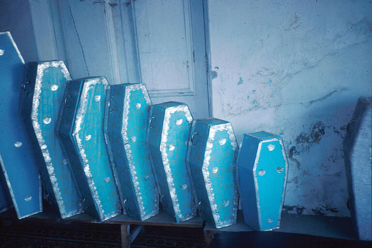 Free blue baby coffins, in a range of sizes, available from the municipal coffin maker, 1982. (Photo by Nancy Scheper-Hughes.)