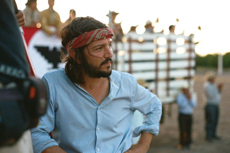 Director Diego Luna looks out over agricultural fields, shooting on location during the filming of “Cesar Chavez.” (Photo courtesy of Canana Films.)