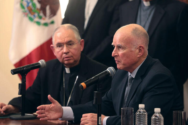 California Governor Jerry Brown and Archbishop of Los Angeles José H. Gomez at a meeting on child migrants in Mexico City, July 2014. (Photo by Justin Short, Office of the Governor.)