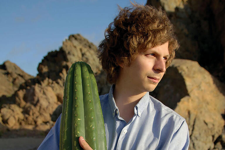 Michael Cera as Jamie clutching a San Pedro cactus, the object of his character’s quest in the film "Crystal Fairy." (Photo courtesy of Diroriro Production Company.)