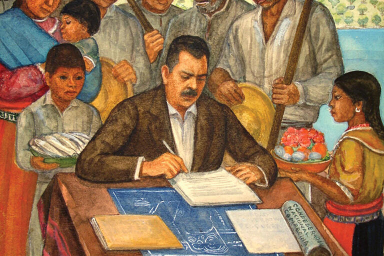 A painting of Lázaro Cárdenas signing the dramatic land redistribution law as Mexico’s president. (Photo by Jujomx.)