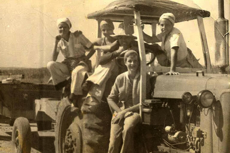 Cuban students seating on a truck 
