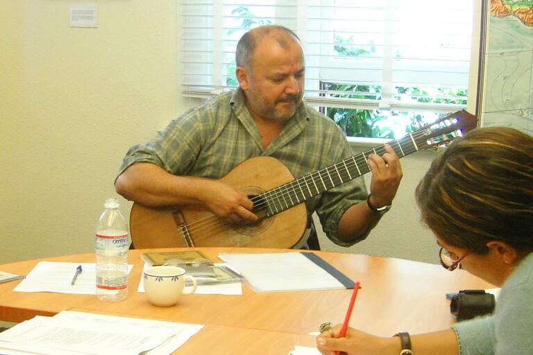Horacio Salinas playing in a classroom at Berkeley