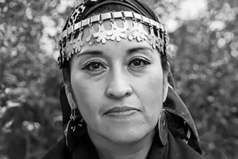 Moira Millán in Indigenous clothing.