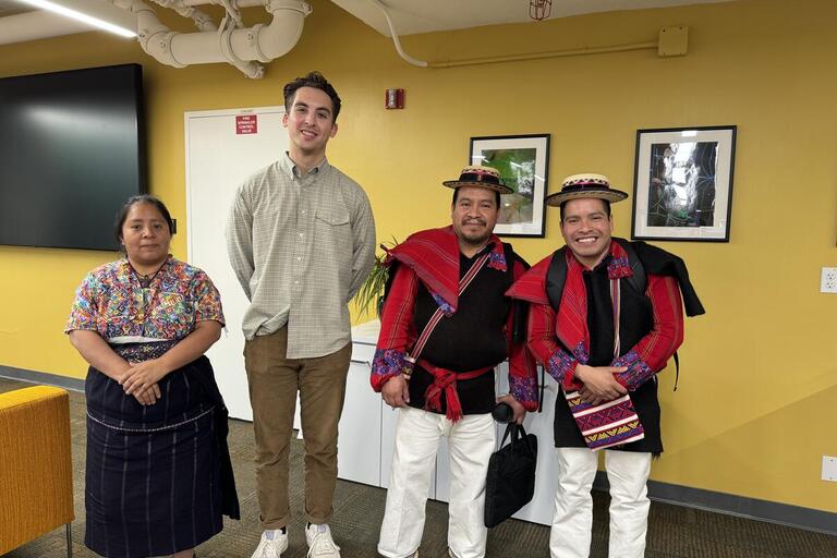 Guatemalan Language Instructors and a student stand in a row