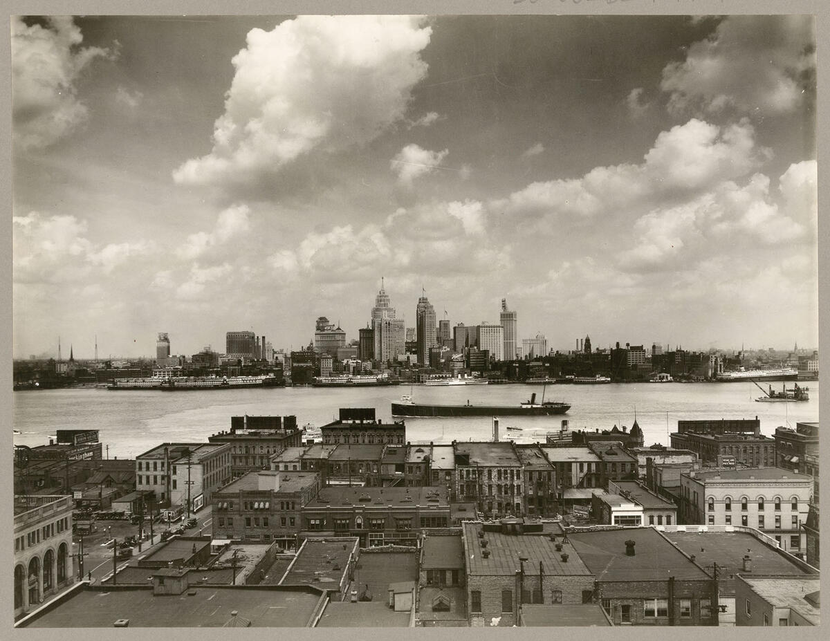 An ore carrier plies the Detroit River towards the Ford Rouge plant, as seen from Windsor, Ontario, circa 1930. (Photo by the Detroit Publishing Company/Library of Congress.) An ore carrier plies the Detroit River towards the Ford Rouge plant, as seen from Windsor, Ontario, circa 1930. (Photo by the Detroit Publishing Company/Library of Congress.)