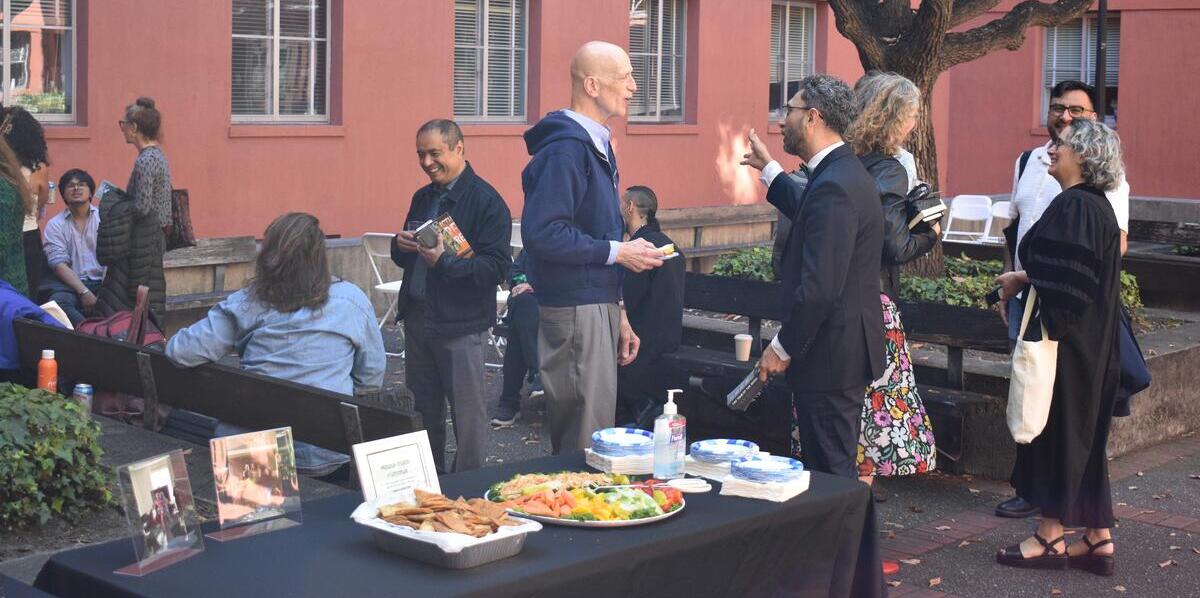 Image of CLACS community members chatting.