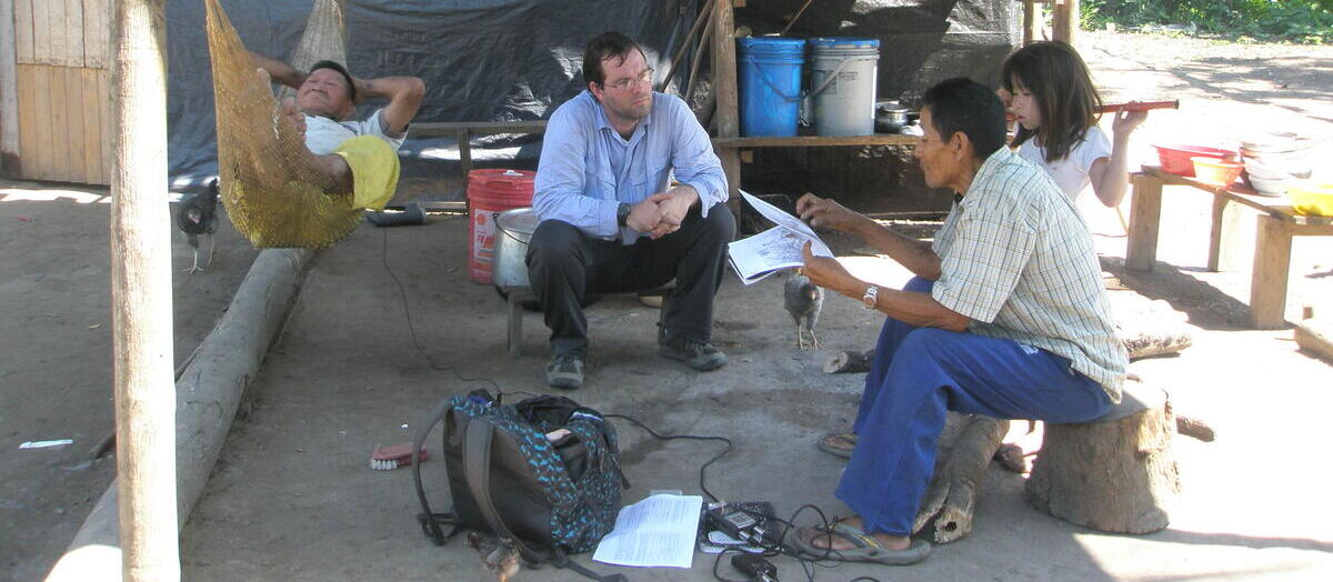 Pascual relates a hunting story to his brother-in-law José. From left to right: José Ramirez Rios, Jevon Heath, Pascual Gomez Flores, Myra Ramirez.