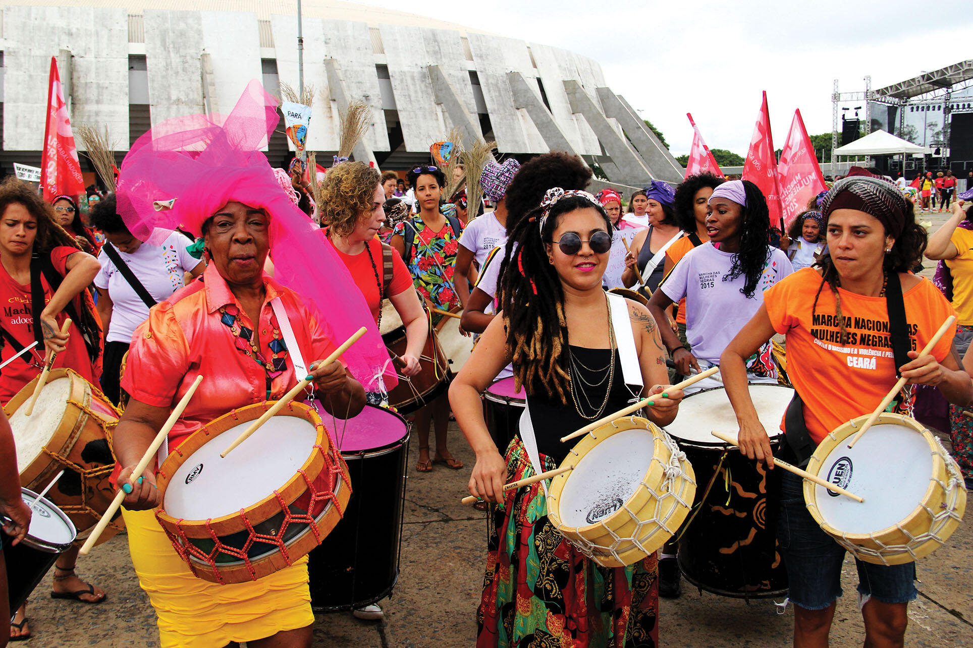 A group of colorfully dressed drummers in Brazil’s National March of Black Women Against Racism, Violence, and for the Good Life, October 2015. (Photo courtesy of UN Women.)