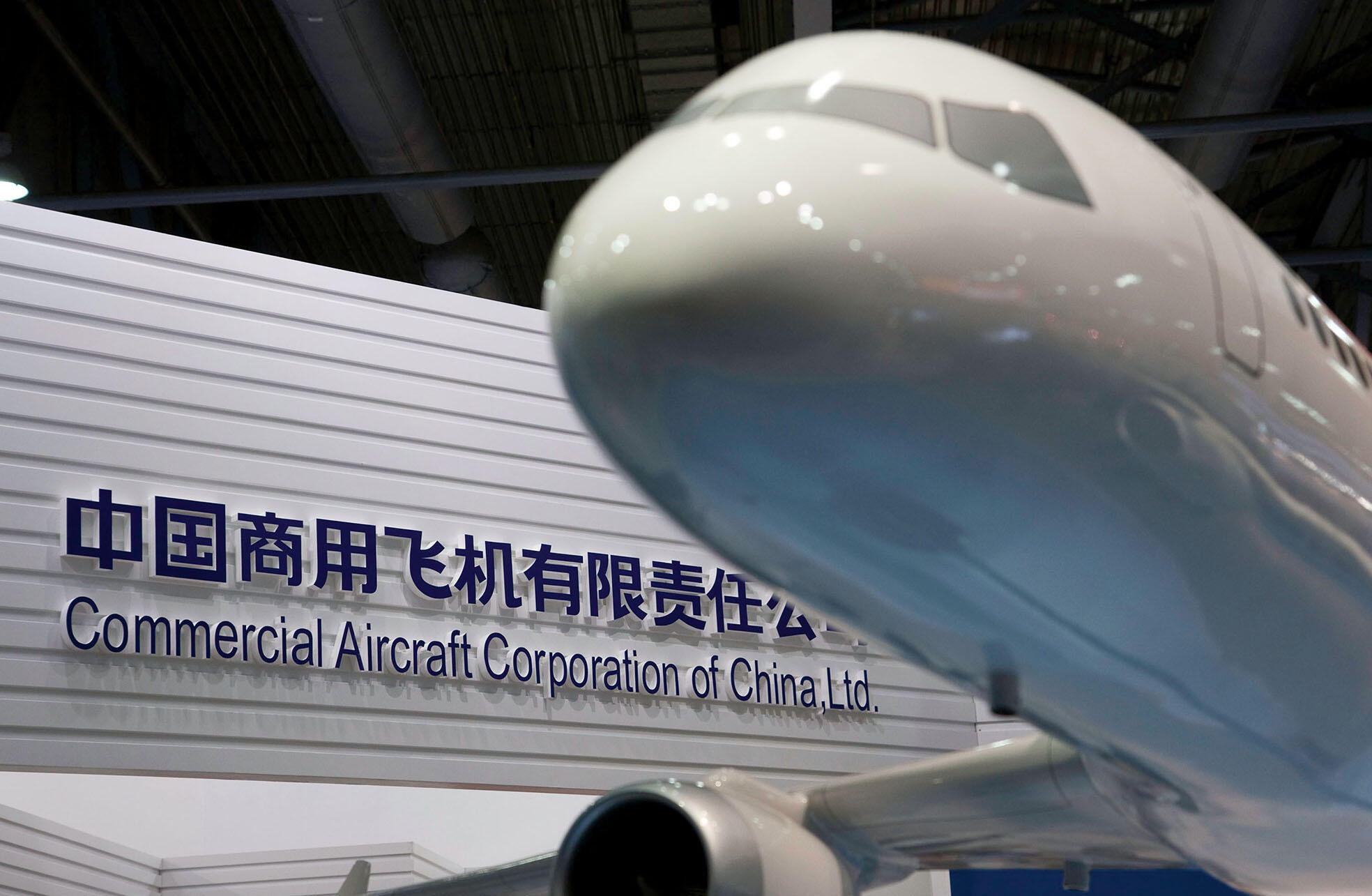 Commercial Aircraft Corporation of China, whose booth at a trade fair is shown here, announced orders for 100 new C919 jetliners in November 2010. (Photo by Jerome Favre/Bloomberg via Getty Images.)