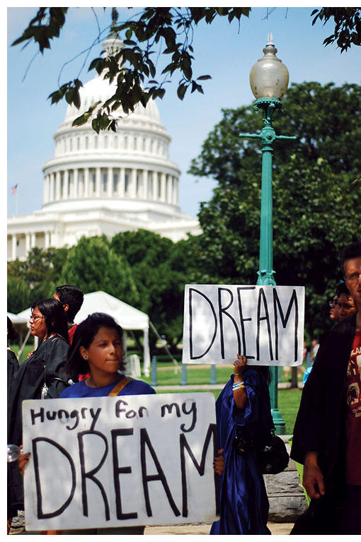 Undocumented students participate in a DREAM graduation ceremony in Washington, D.C. (Photo by Juan David Gastolomendo.)