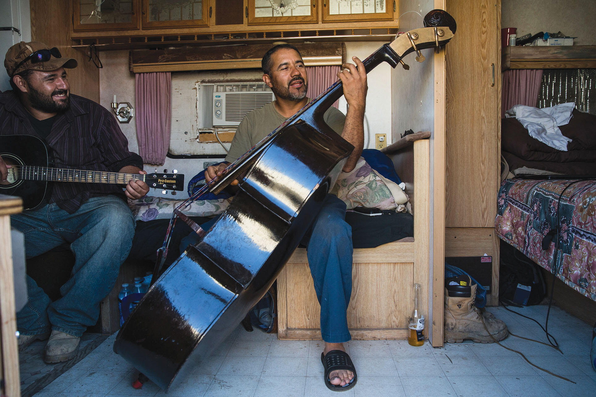 North Dakota has seen an influx of workers, such as these playing Latin American music, from around the globe due to its recent oil boom. (Photo by Andrew Burton/Getty Images.)