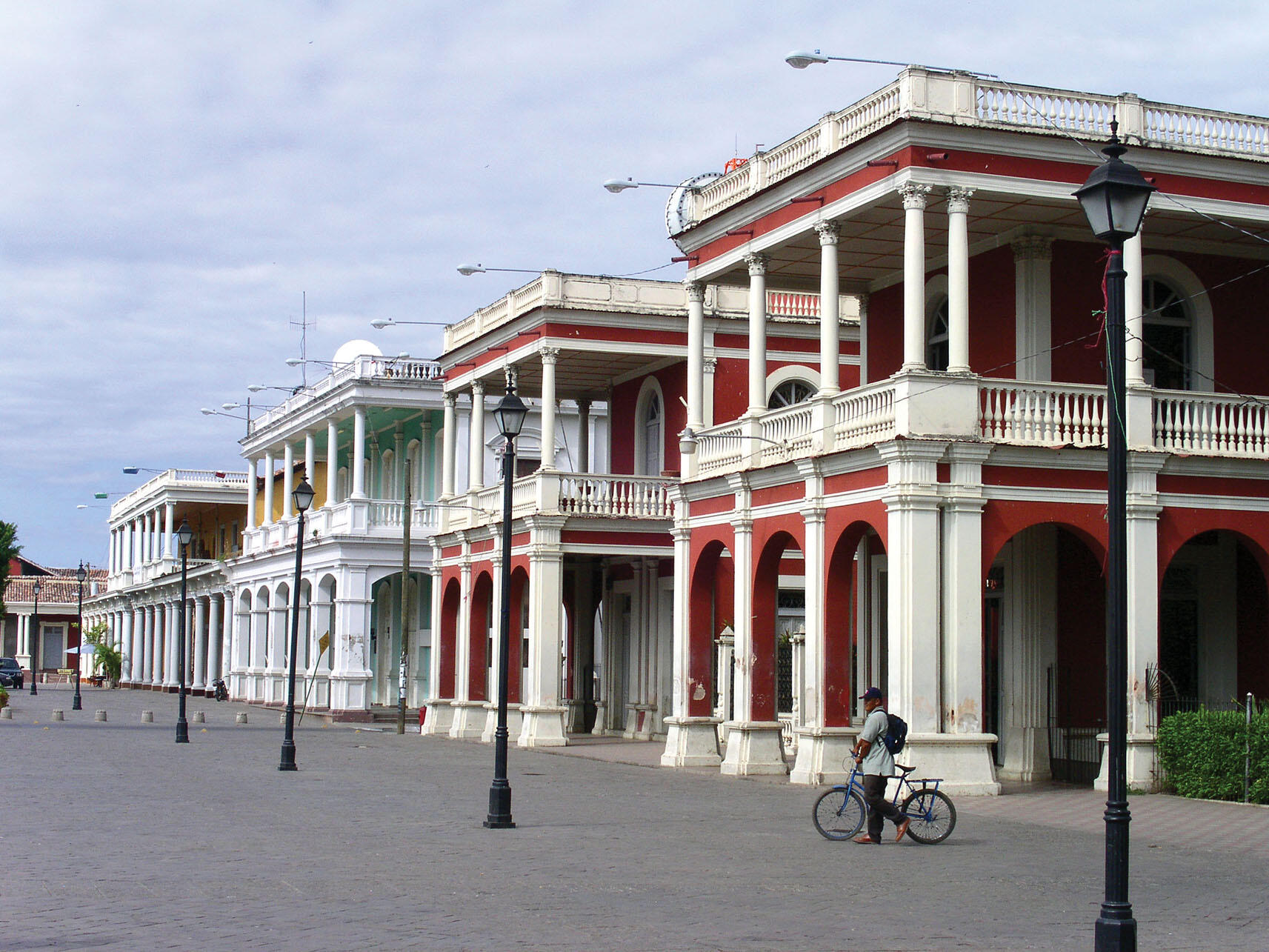 Historic architecture becomes another facet of national pride, as in this town square with colonial-era buildings in Granada, Nicaragua. (Photo by Shawn Millin.)