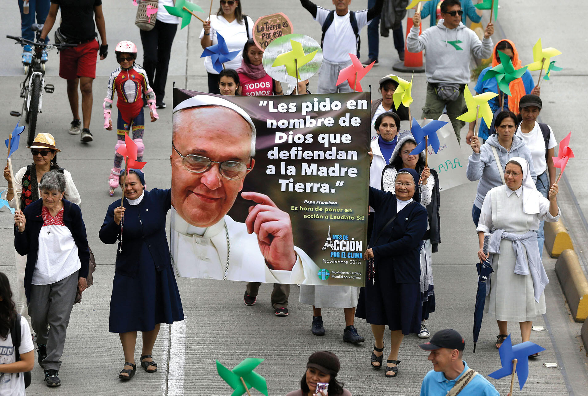  “I ask you in the name of God to defend Mother Earth.” (Photo by Fernando Vergara/AP Photo.)