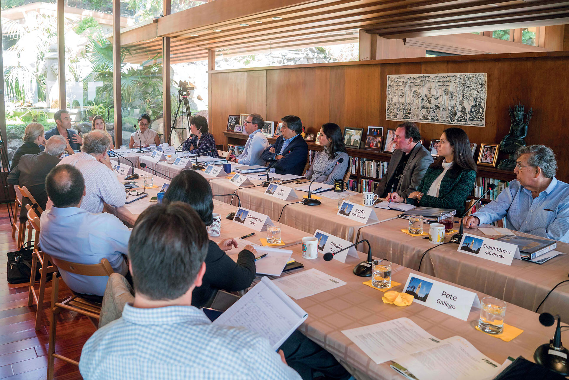 Participants around a conference table discussing the challenges facing the United States and Mexico at the Futures Forum. (Photo by Jim Block.)