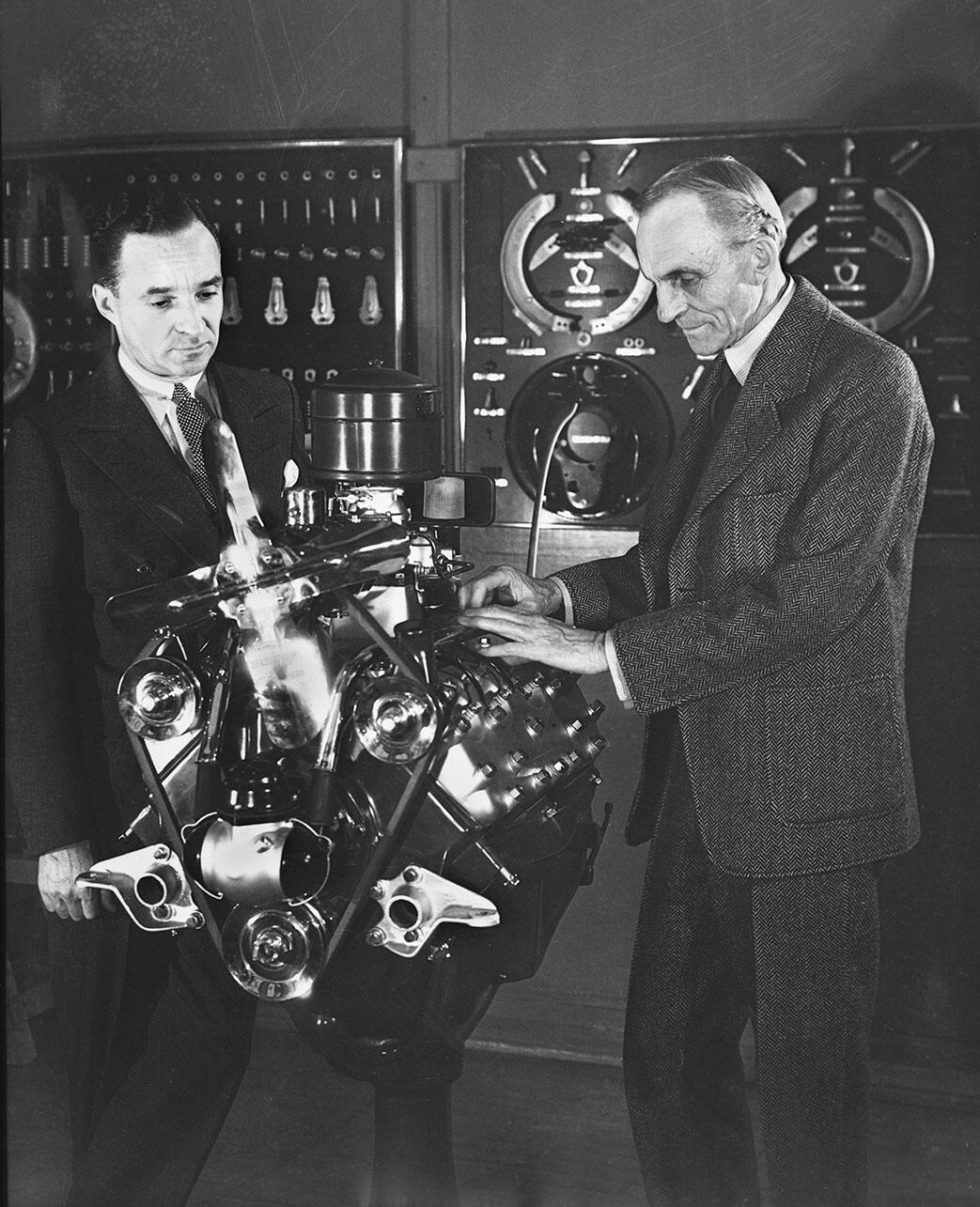  Edsel Ford (left) and Henry Ford examine an early V8 engine. (Photo courtesy of the Ford Motor Company.)