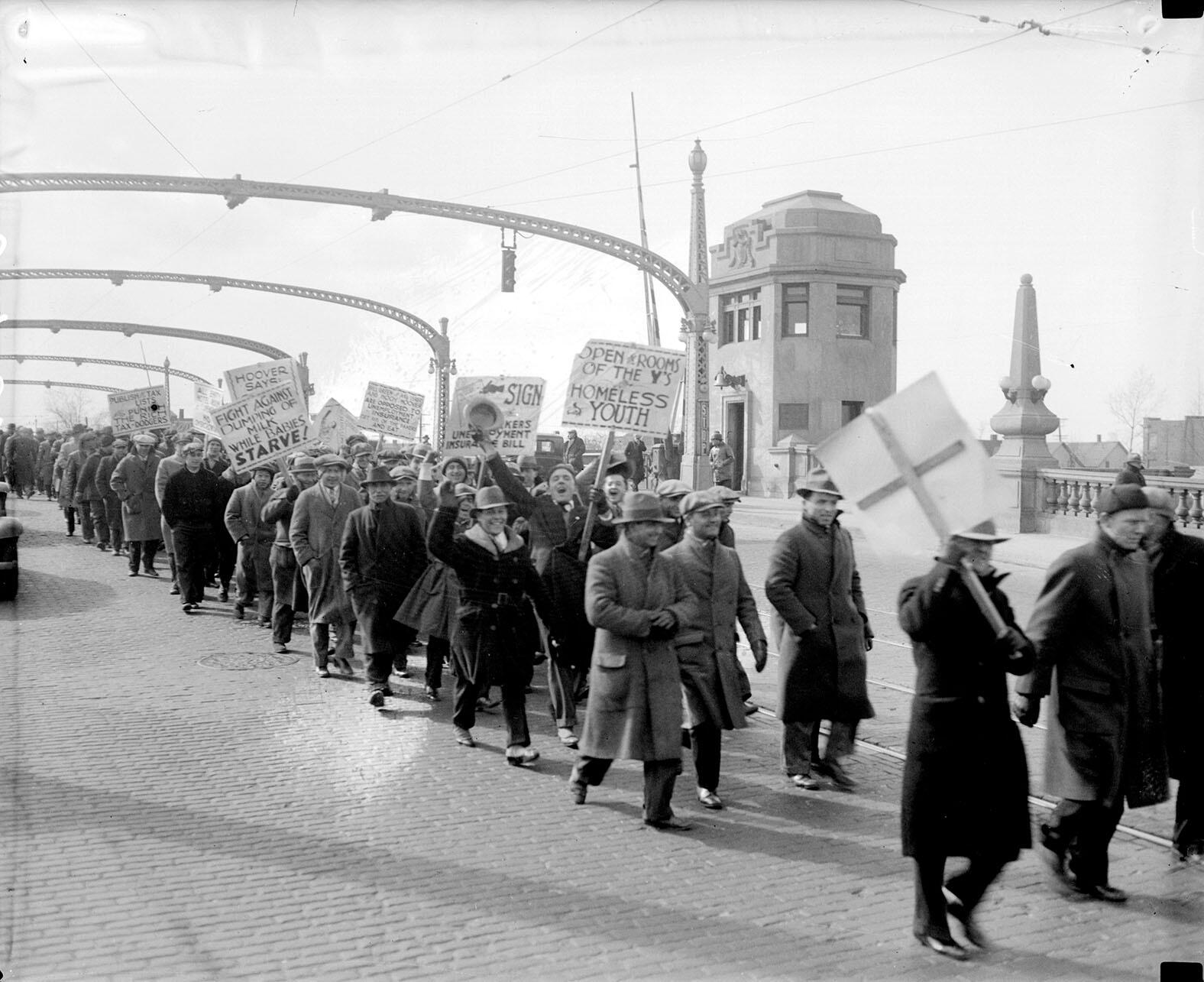 The Ford Hunger March crosses a bridge toward the Rouge Plant, March 1932. (Photo courtesy of the  Walter P.  Reuther Library,  Wayne State University.)