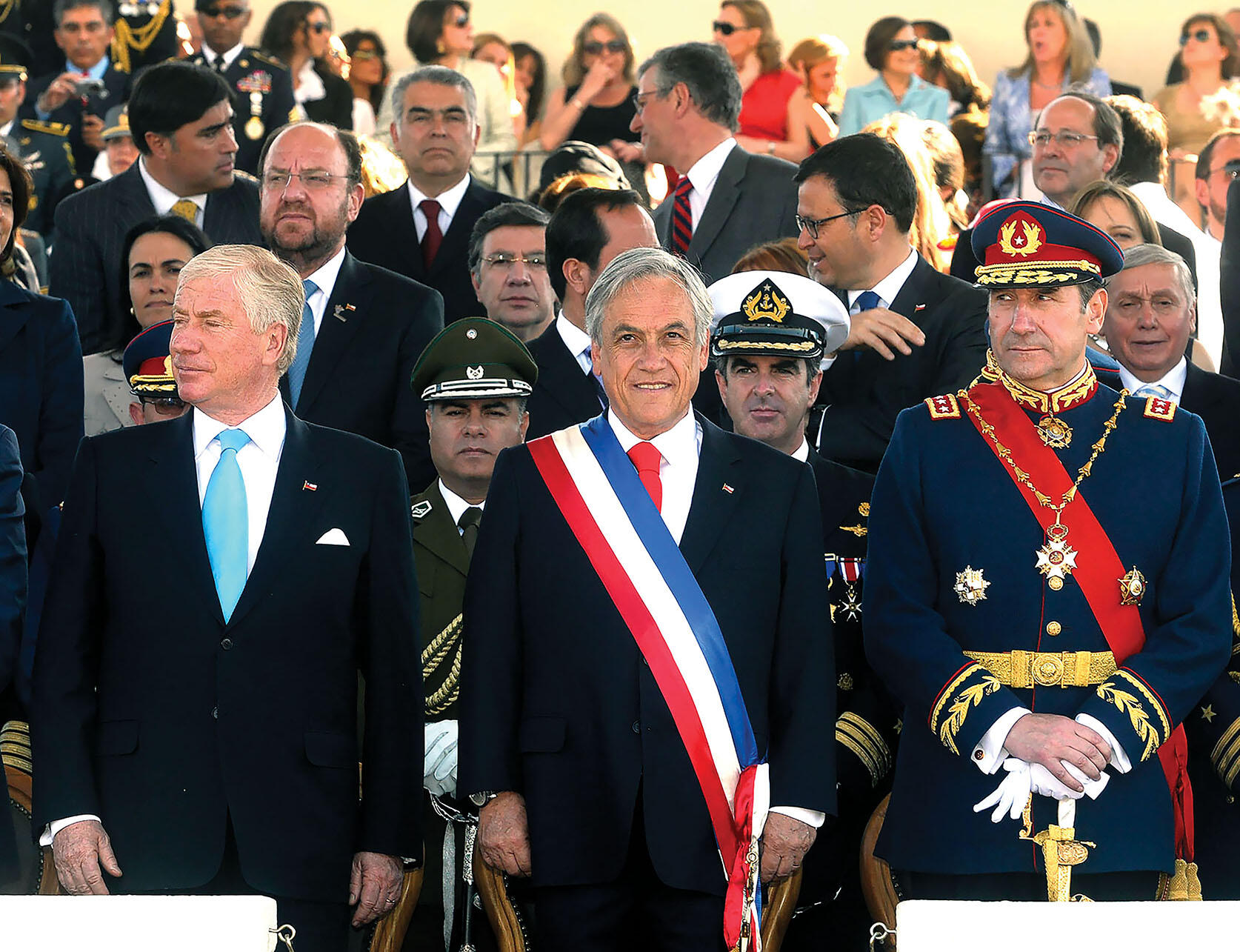 President Sebastián Piñera surrounded by military officers at a parade in 2010. (Photo courtesy of Gobierno de Chile.)