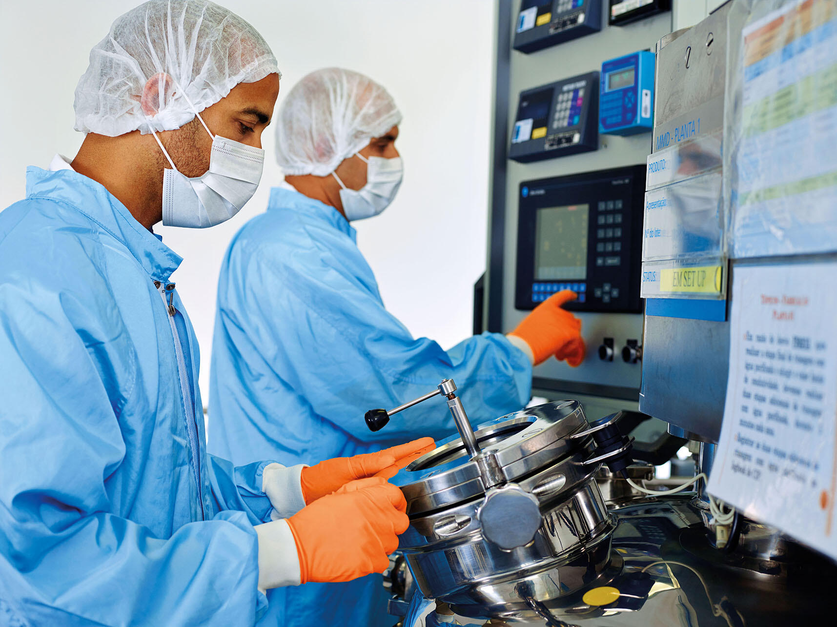 Workers produce generic pharmaceuticals at a factory in Brazil. (Photo courtesy of GlaxoSmithKline.)