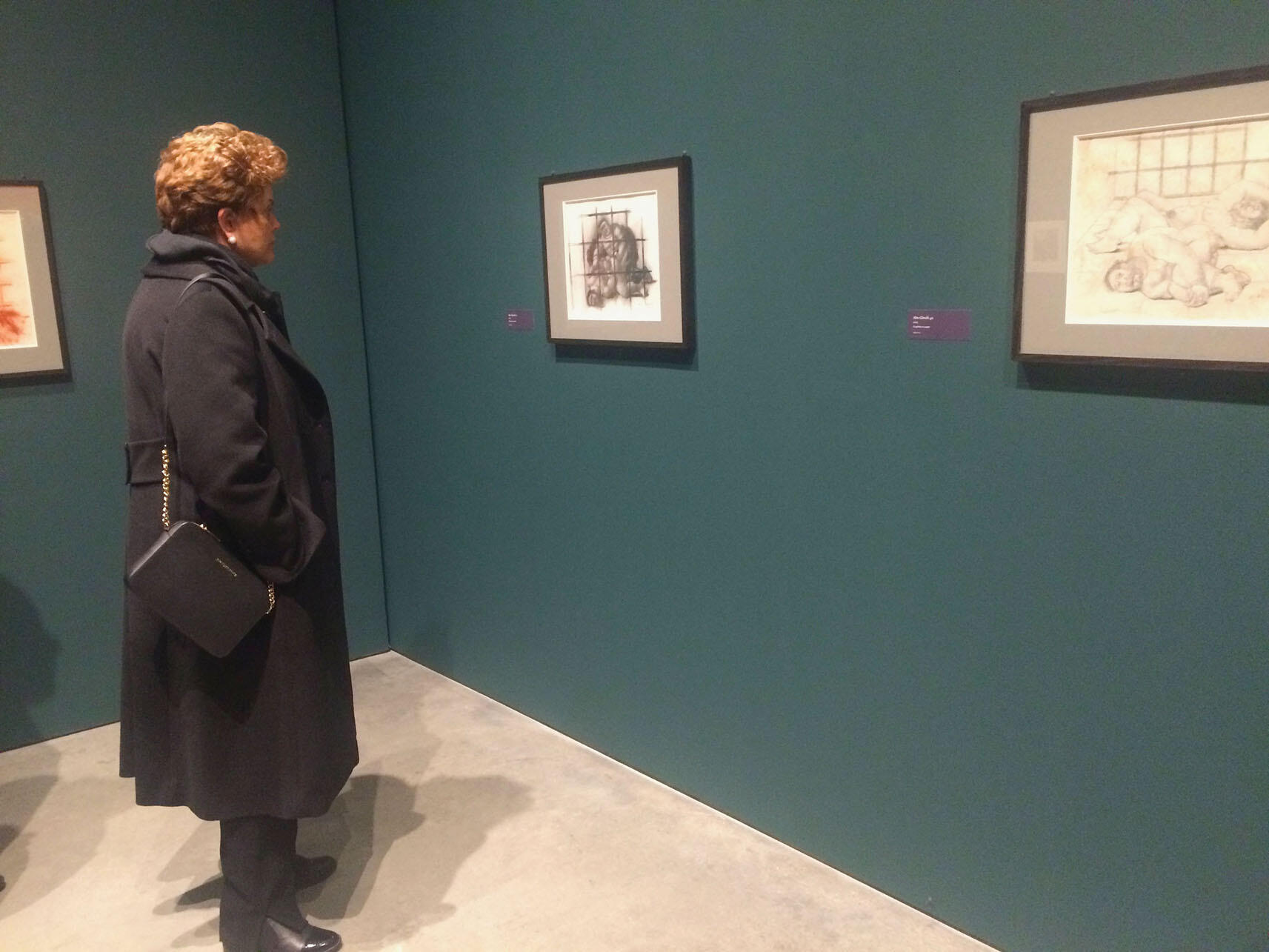 Dilma Rousseff gazes at Botero’s “Abu Ghraib 17” in the Berkeley Art Museum. (Photo by Isabel Nogueira.)
