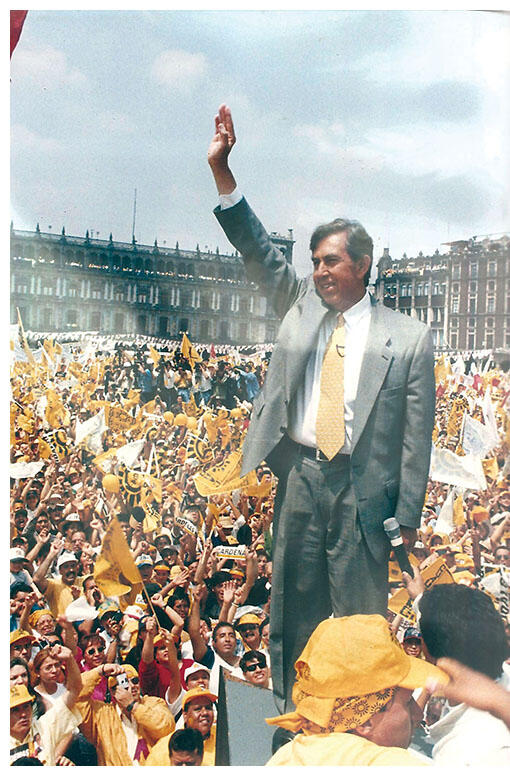 In the Zocalo, Cuauhtémoc Cárdenas waves to yellow-clad supporters as he campaigns for Head of Government of Mexico City, 1997. (Photo courtesy of Cuauhtémoc Cárdenas.)