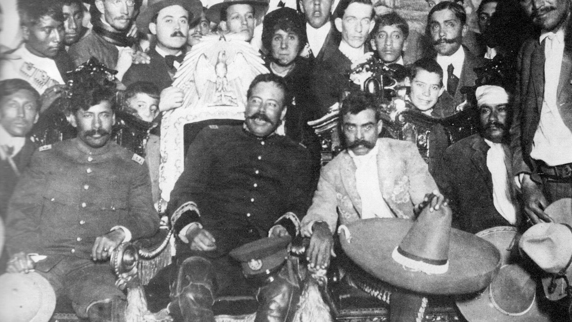 Pancho Villa (in the presidential chair) with Emiliano Zapata and supporters in Mexico City. (Photo courtesy of the Library of Congress.)