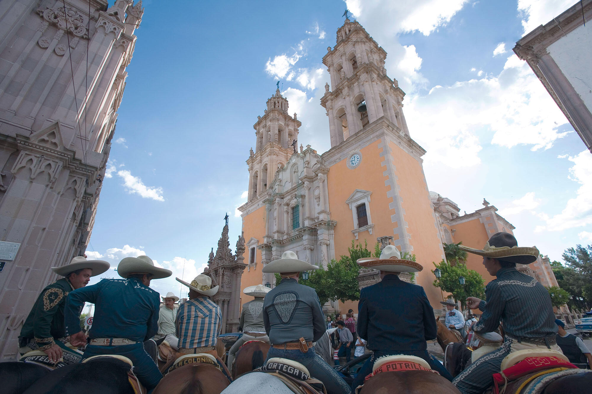 A group of Mexican cowboys, or charros, parade on horseback through the streets of Jerez, Mexico. (Photo courtesy of the Zacatecas Ministry of Tourism.)