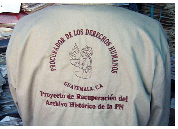 he logo of the Guatemalan prosecutor’s team of inspectors on the back of one of their lab coats. (Photo courtesy of Kate Doyle.)