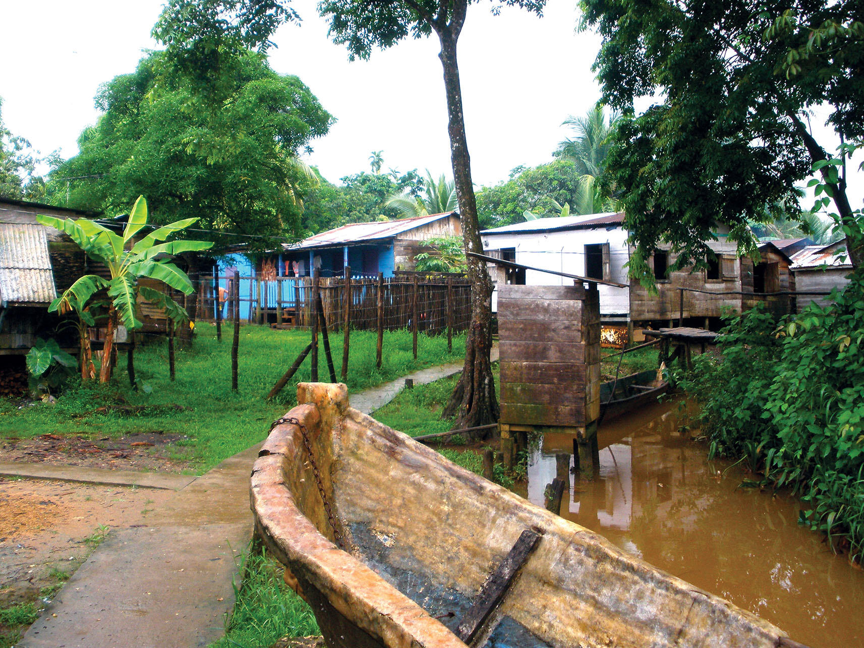 Outhouses are poised above canals, draining untreated waste into waterways in Nicaragua. (Photo courtesy of blueEnergy.)