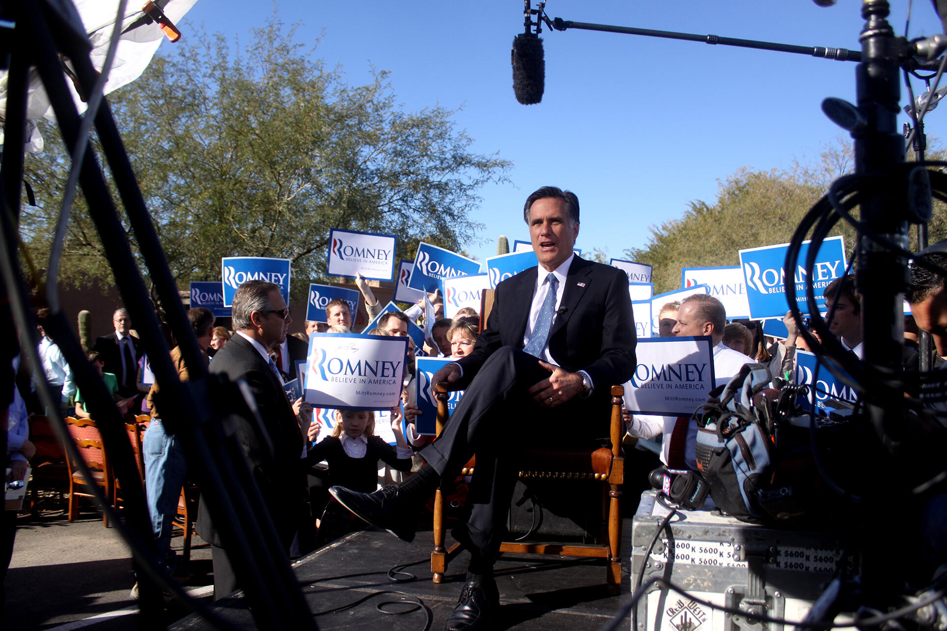 Mitt Romney gives an interview on stage in 2012 at a rally in Paradise Valley, Arizona. (Photo by Gage Skidmore.)