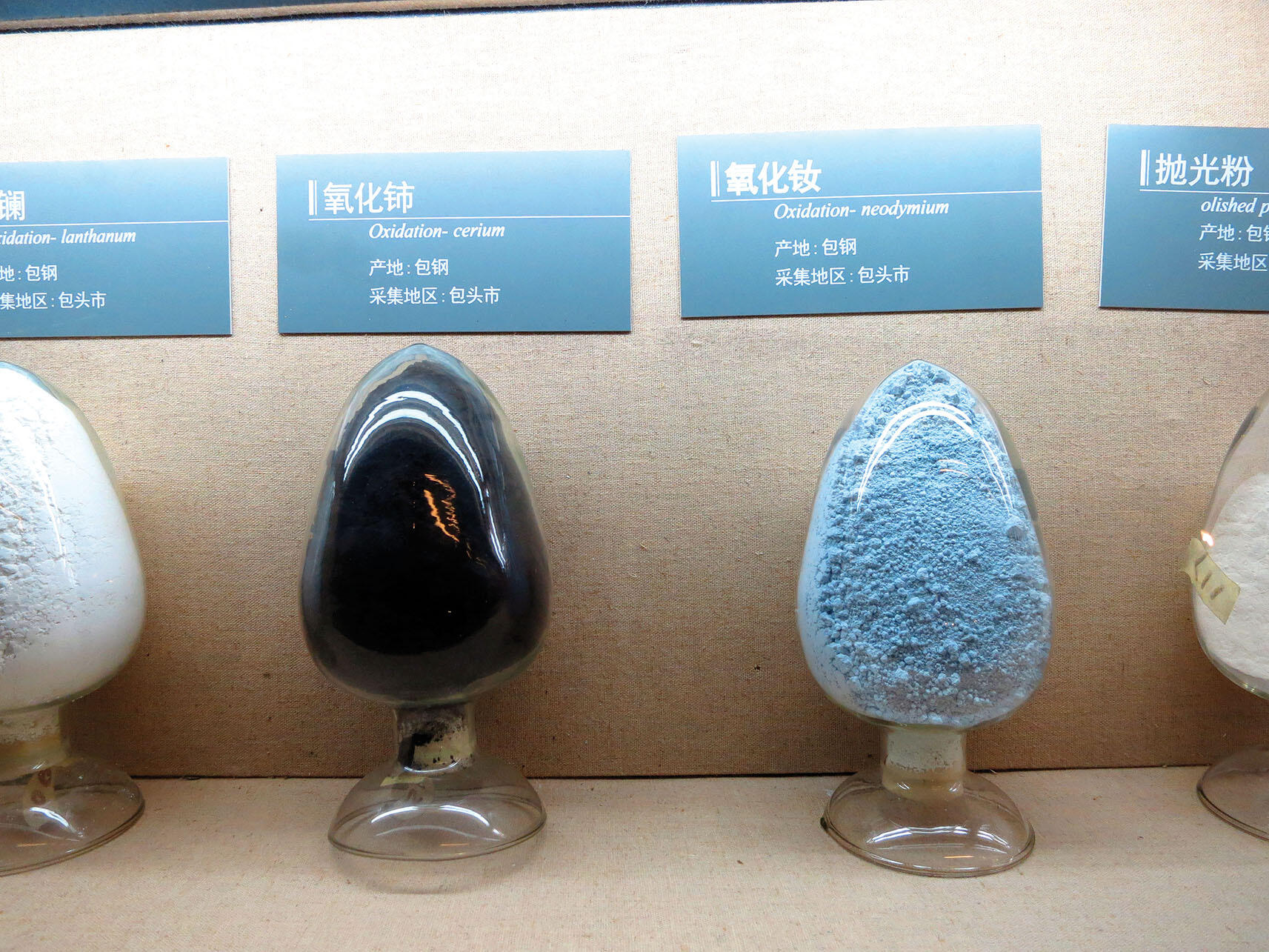Small glass eggs filled with powdery rare earth ores on display in the Inner Mongolia Autonomous Region Museum, Hohhot, China. (Photo by Julie Klinger.)