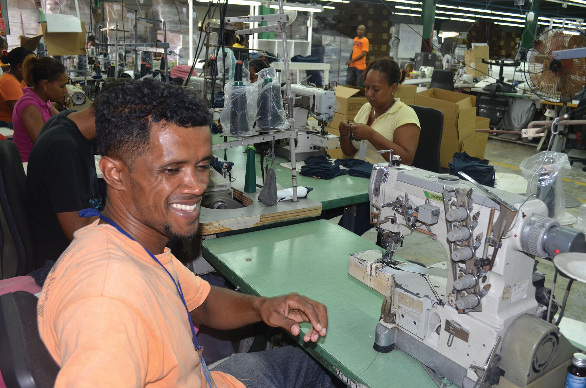 Laborers sew together garments in a safe working environment at the Alta Gracia College Apparel Factory in Santo Domingo, Dominican Republic. (Photo by Living-Learning Programs.)