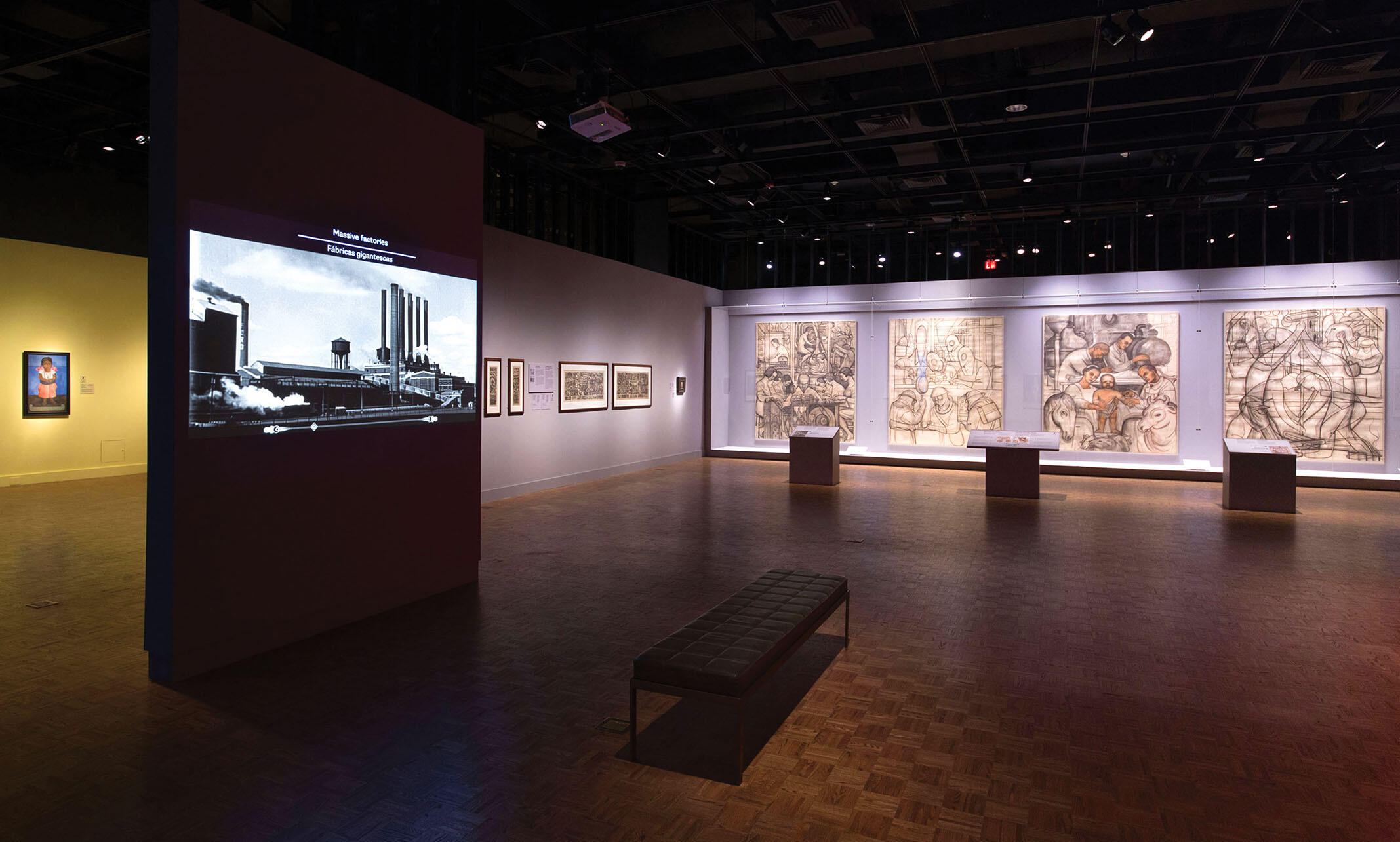 The gallery of “Diego Rivera and Frida Kahlo in Detroit;” visitors are greeted by video of the River Rouge Plant and Rivera’s “cartoons,” rarely displayed preparatory sketches for the murals. (Photo courtesy of the Detroit Institute of Arts.)