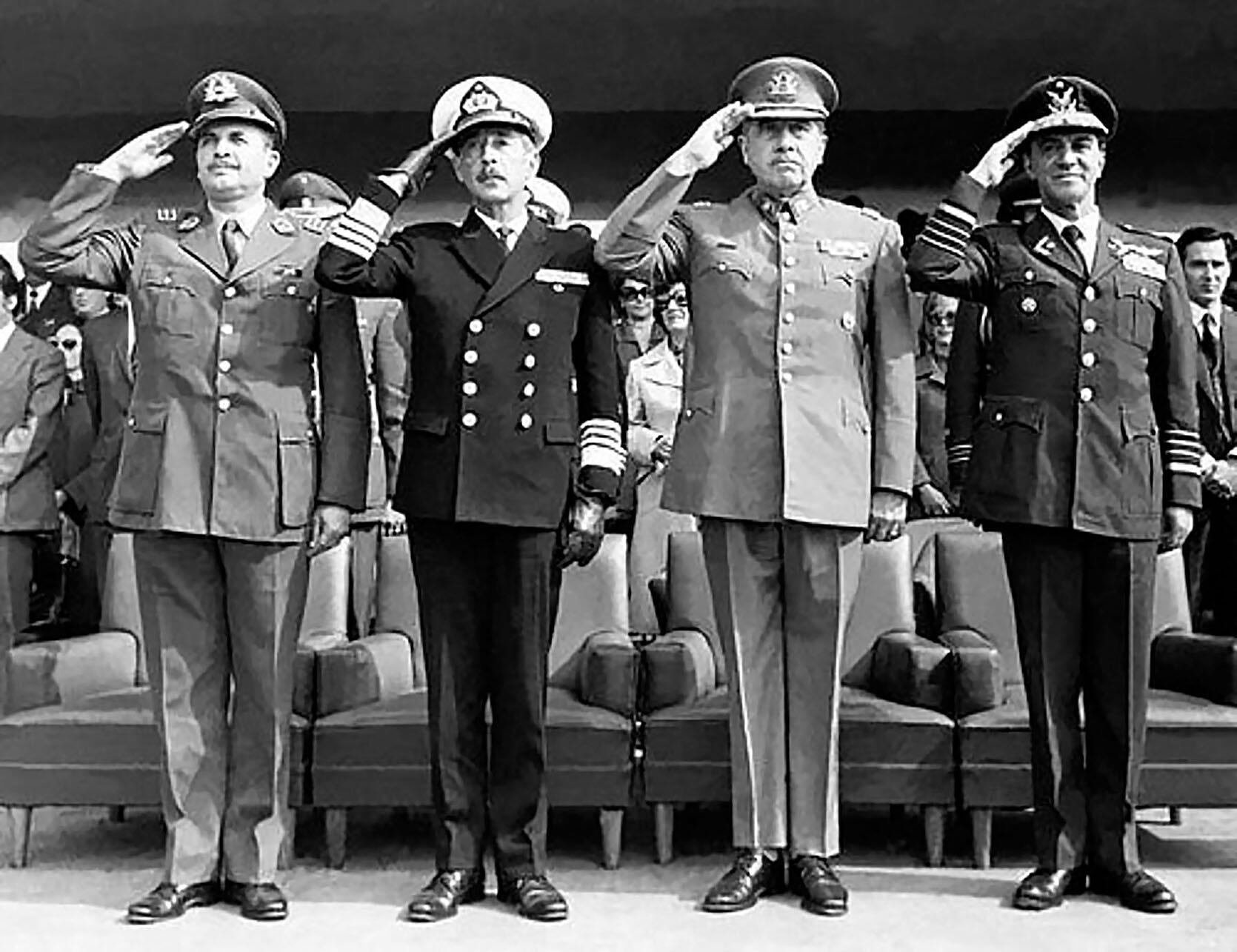The four leaders of the September 1973 coup in Chile pose while saluting. (Photo from Wikimedia Commons.)